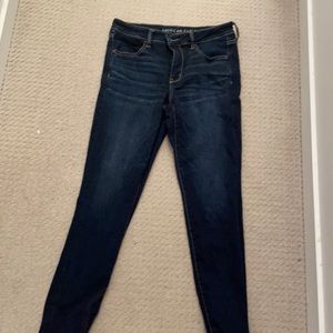 Dark wash skinny jeans.